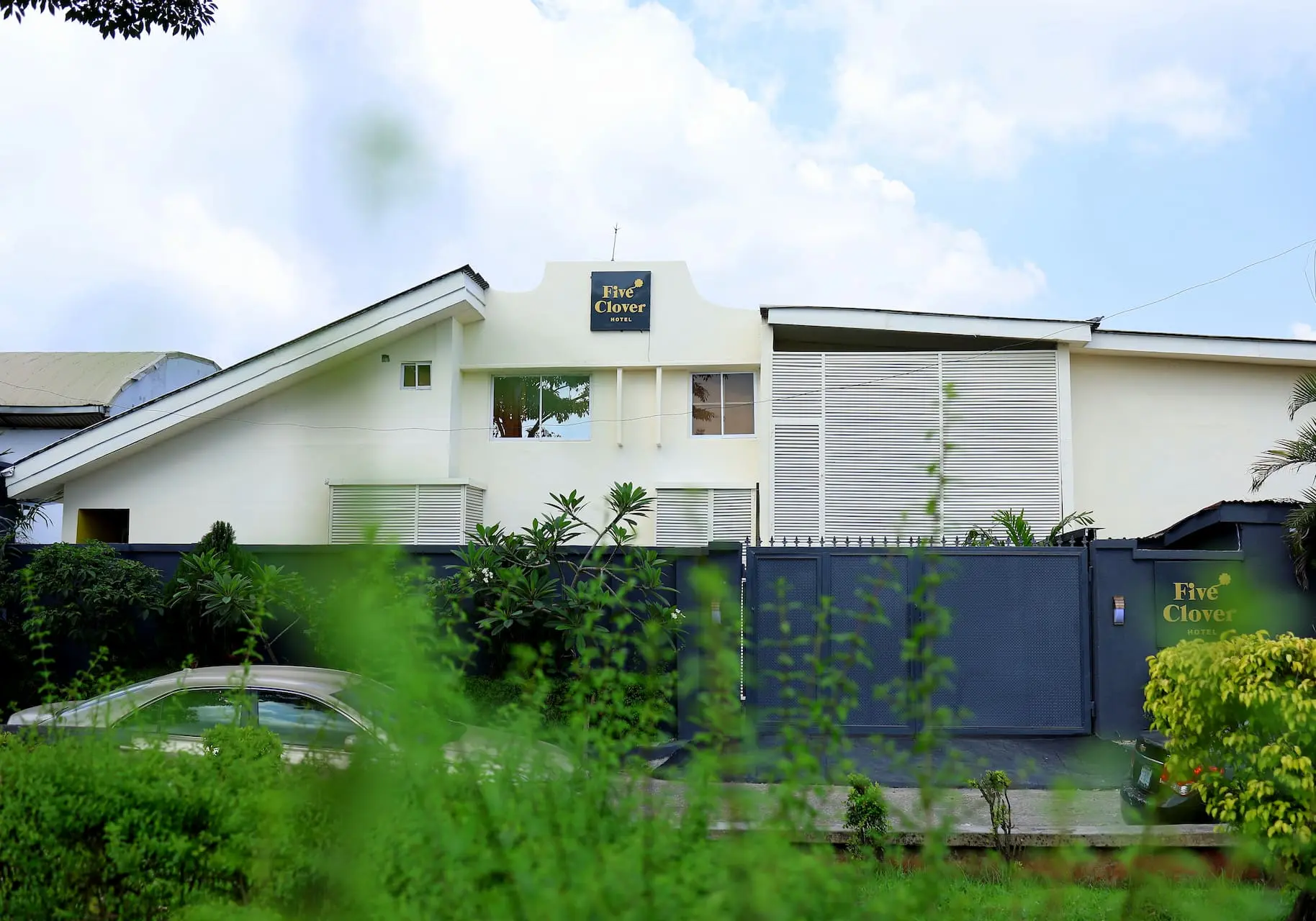 Five Clover Hotel - Luxury hotel room with modern amenities and elegant design